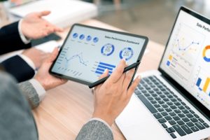 Marketing professional reviewing Google Ads campaign performance and paid search analytics.